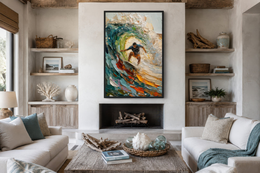 Surfer riding a wave framed canvas wall art displayed above a fireplace in a coastal living room.