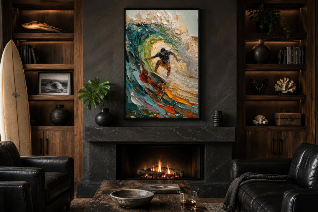 Impressionistic framed canvas wall art of a surfer riding a colorful wave above a fireplace.