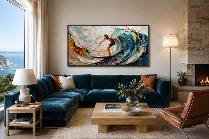 Abstract surfing wall art of a surfer on a vibrant blue wave above a teal sectional sofa.