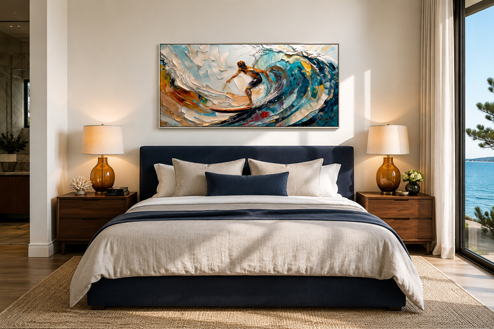 Abstract surfer canvas painting with vibrant ocean waves hanging above a navy blue bed.