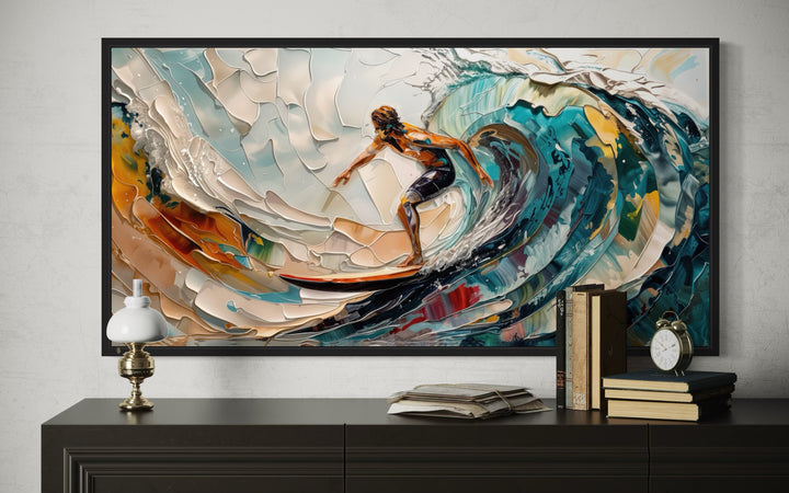 Framed abstract surfing wall art featuring a surfer riding a vibrant, textured ocean wave.