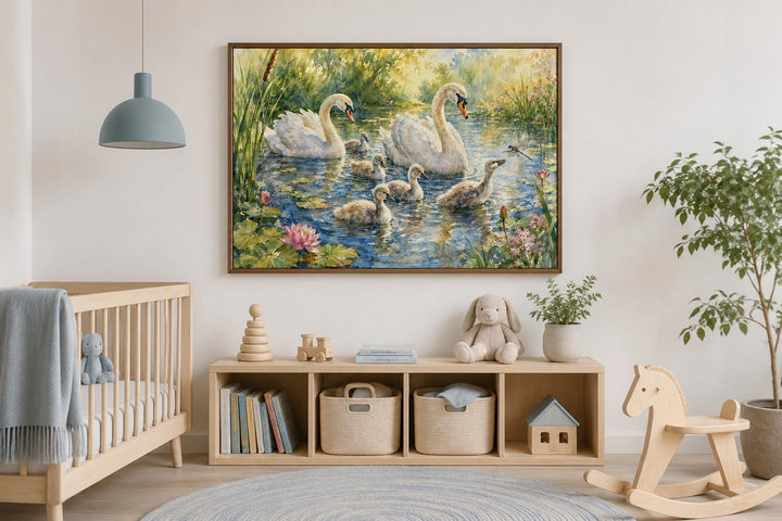 Swan family with cygnets canvas art hanging in a neutral-toned nursery above a wooden toy shelf.