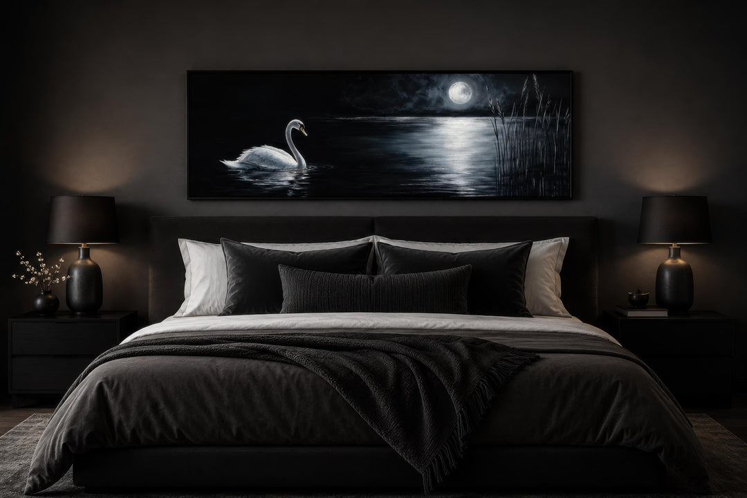 Long narrow canvas print of a white swan on a moonlit lake above a dark, moody bed.