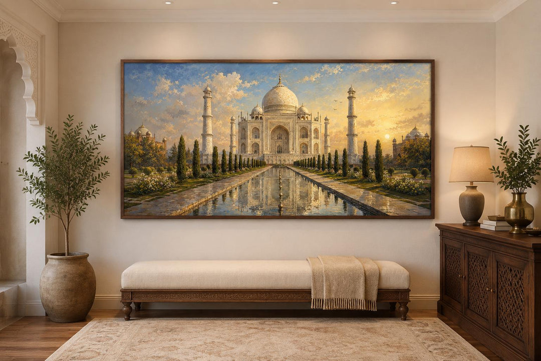 Wide horizontal canvas wall art of the Taj Mahal at sunrise above a bench in an elegant room.