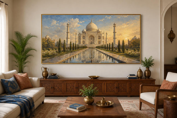 Taj Mahal at sunrise canvas wall art hanging above a wooden console in an elegant living room.