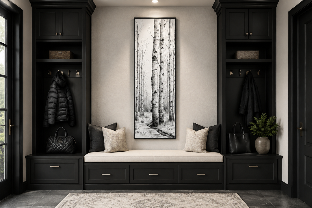 Tall narrow black and white vertical framed canvas wall art featuring birch trees in a winter forest
