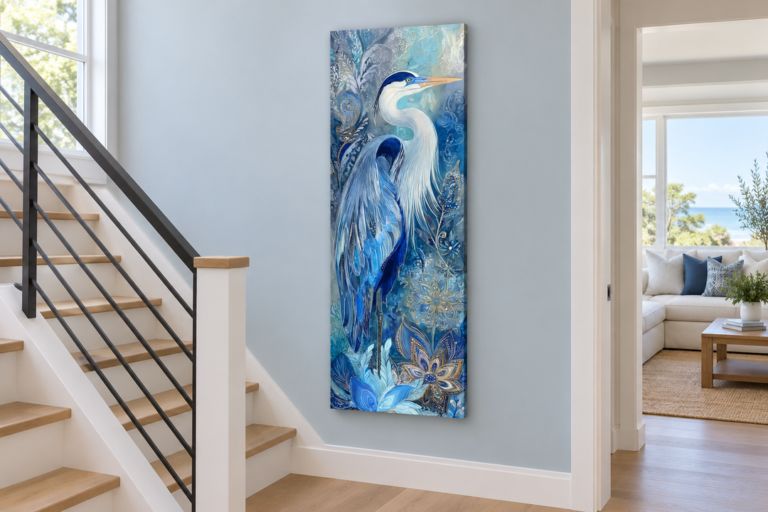 Tall narrow blue heron canvas print on a light blue wall in a modern staircase landing.