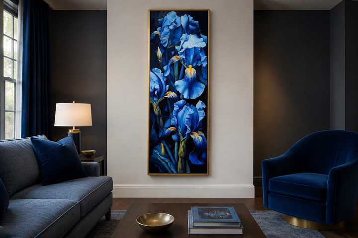 Vertical framed canvas wall art featuring tall blue irises on a black background in a living room.