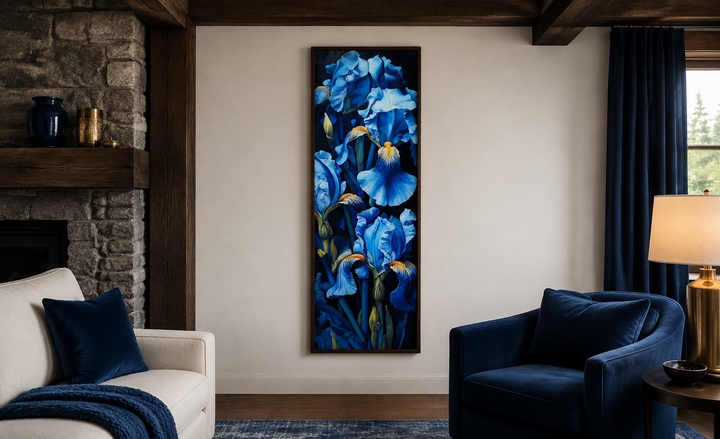 Tall narrow vertical framed canvas wall art featuring blue irises on a black background.