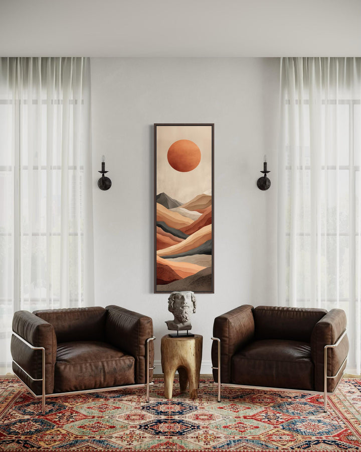 Tall narrow vertical canvas print of a terracotta desert landscape with a modern mountain horizon.