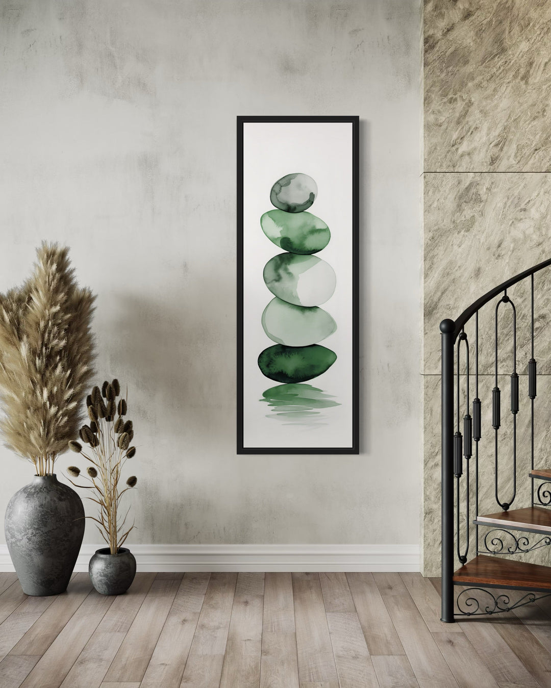 Tall Narrow Forest Green White Stacked Rocks Vertical Framed Canvas Wall Art in a living room with a couch and a painting on the wall