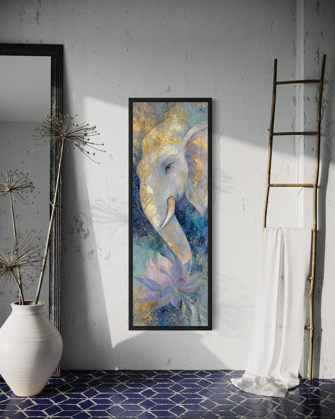 Tall narrow vertical wall art of Lord Ganesh and a lotus in blue and gold tones with a black frame.