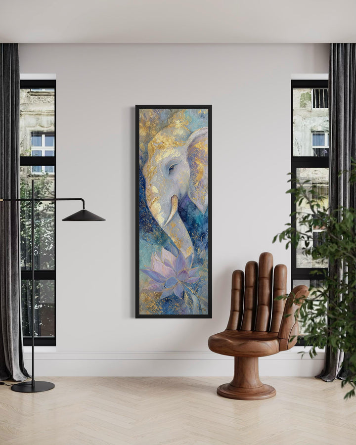 Tall narrow Ganesh wall art featuring a blue and gold elephant and lotus in a modern room.
