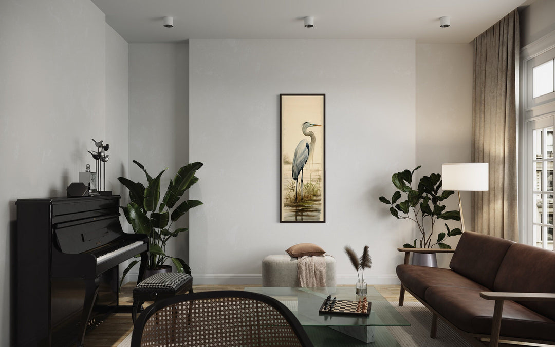 Tall narrow vertical framed canvas wall art featuring a great egret in a serene coastal setting.