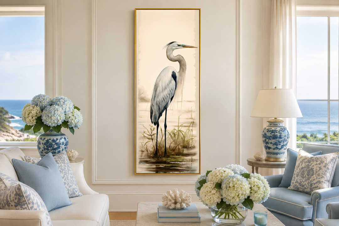 Tall narrow framed canvas wall art featuring a great egret in a coastal living room setting.