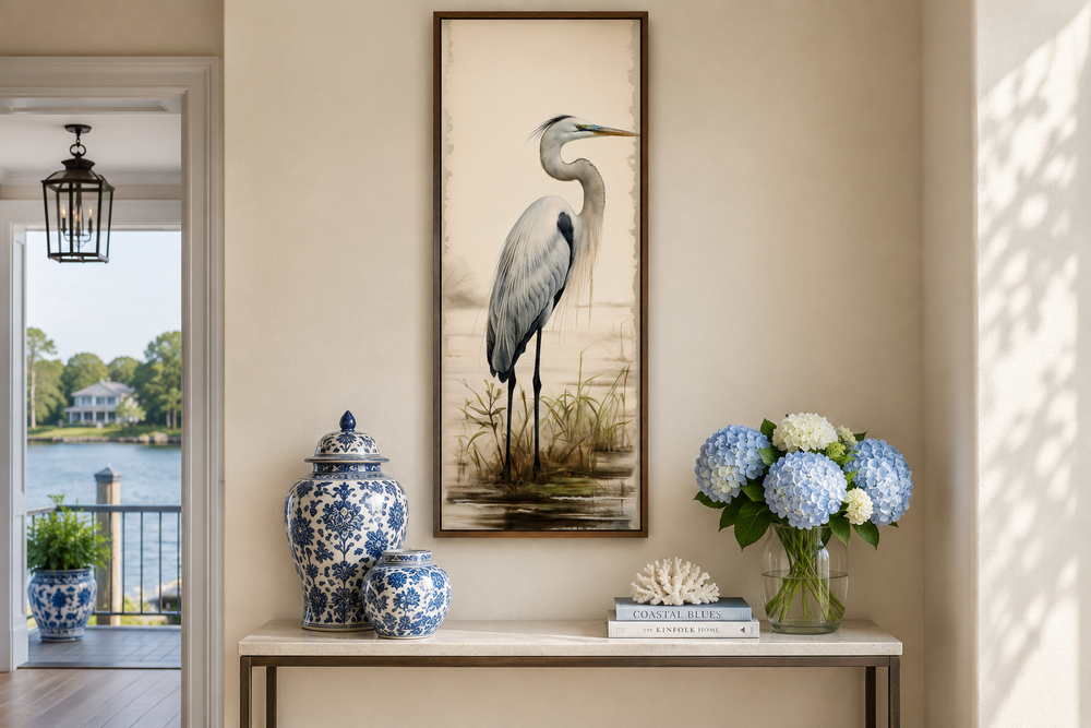 Tall narrow framed canvas wall art featuring a graceful great egret in a coastal landscape.