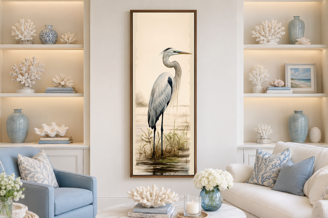Tall narrow framed canvas wall art featuring a graceful great egret in a coastal-inspired setting.