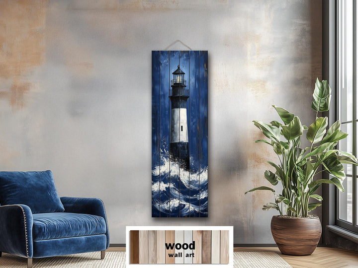 Tall narrow vertical wood wall art featuring a lighthouse amidst crashing ocean waves.