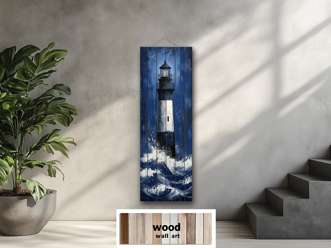 Tall narrow lighthouse in ocean waves vertical distressed wood wall art hanging on a gray wall.