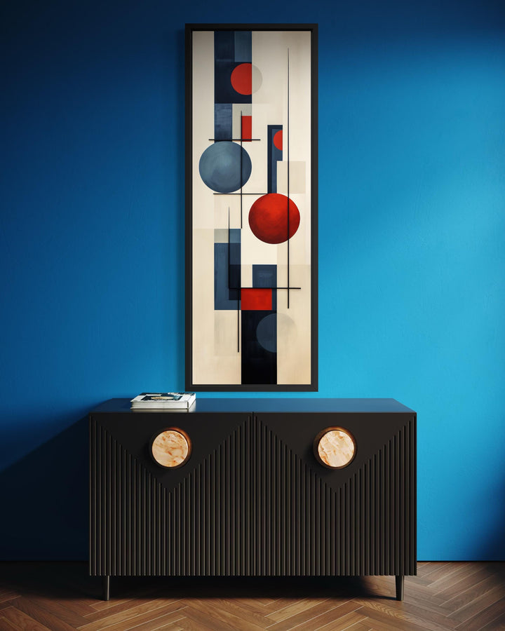 Tall narrow mid-century modern geometric wall art with abstract red and blue circles and lines.