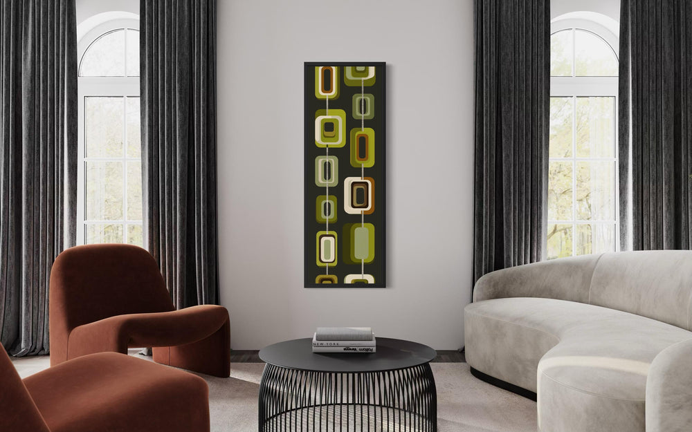 Tall narrow mid-century modern olive green geometric canvas print on a white wall.