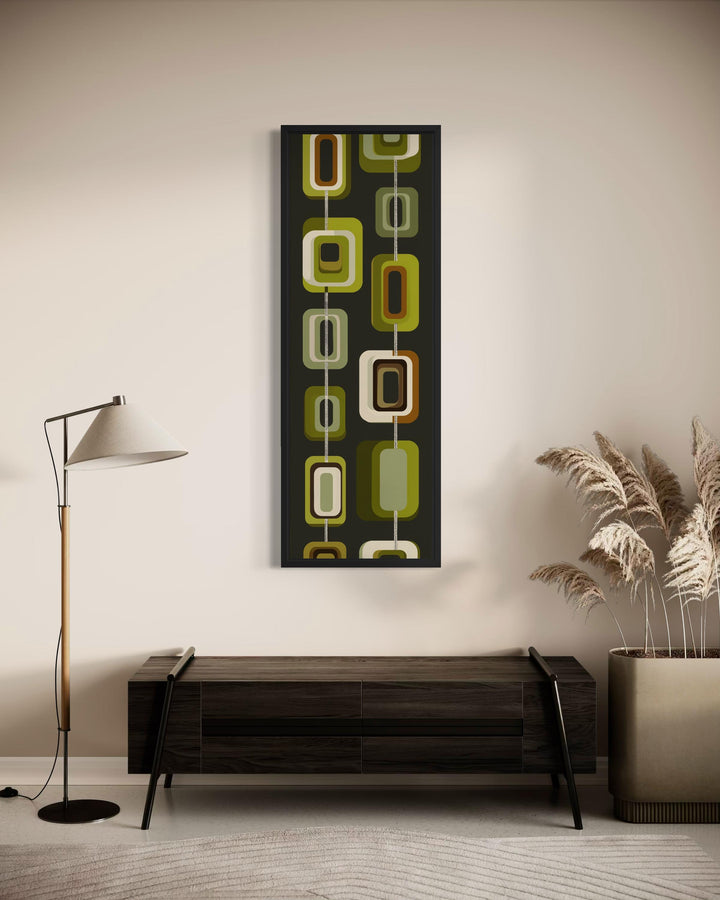 Tall narrow mid-century modern olive green geometric canvas print in a black frame.