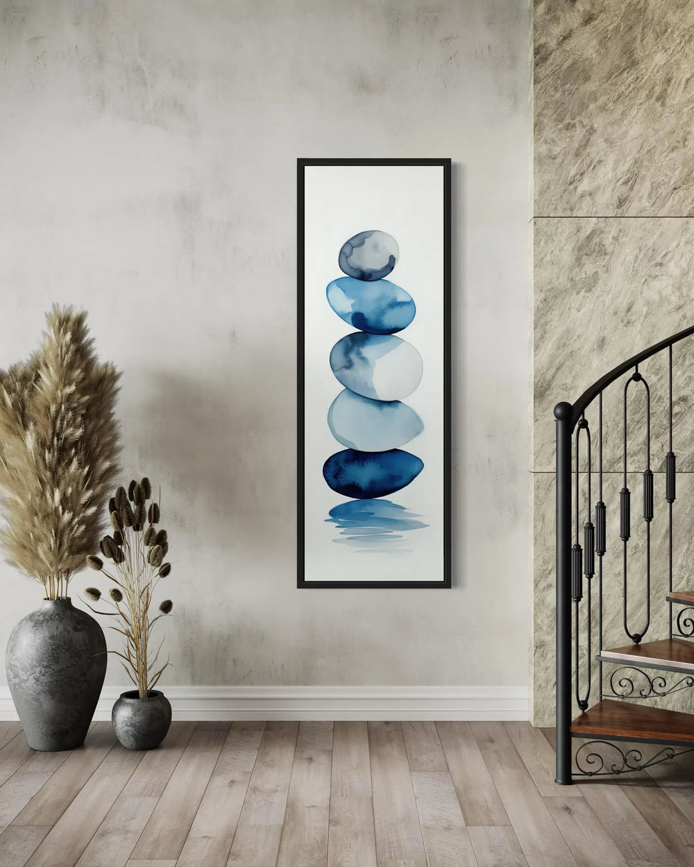 Tall Narrow Navy Blue White Stacked Rocks Vertical Framed Canvas Wall Art in a room with a spiral staircase and a painting on the wall