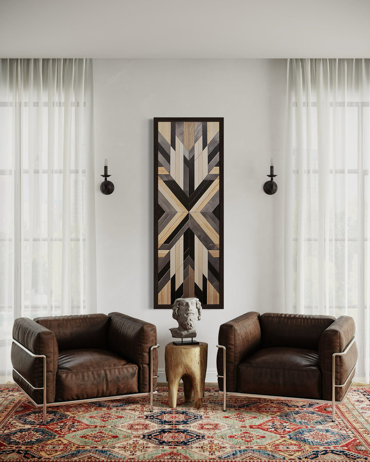 Tall narrow vertical framed canvas wall art with neutral brown Aztec geometric patterns.