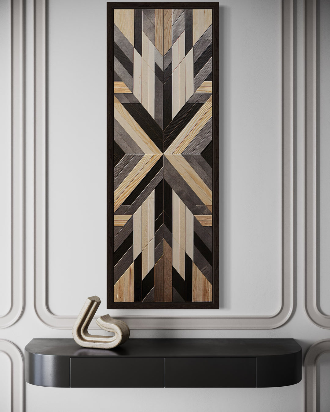 Tall narrow vertical framed canvas wall art with neutral brown Aztec-inspired geometric patterns.