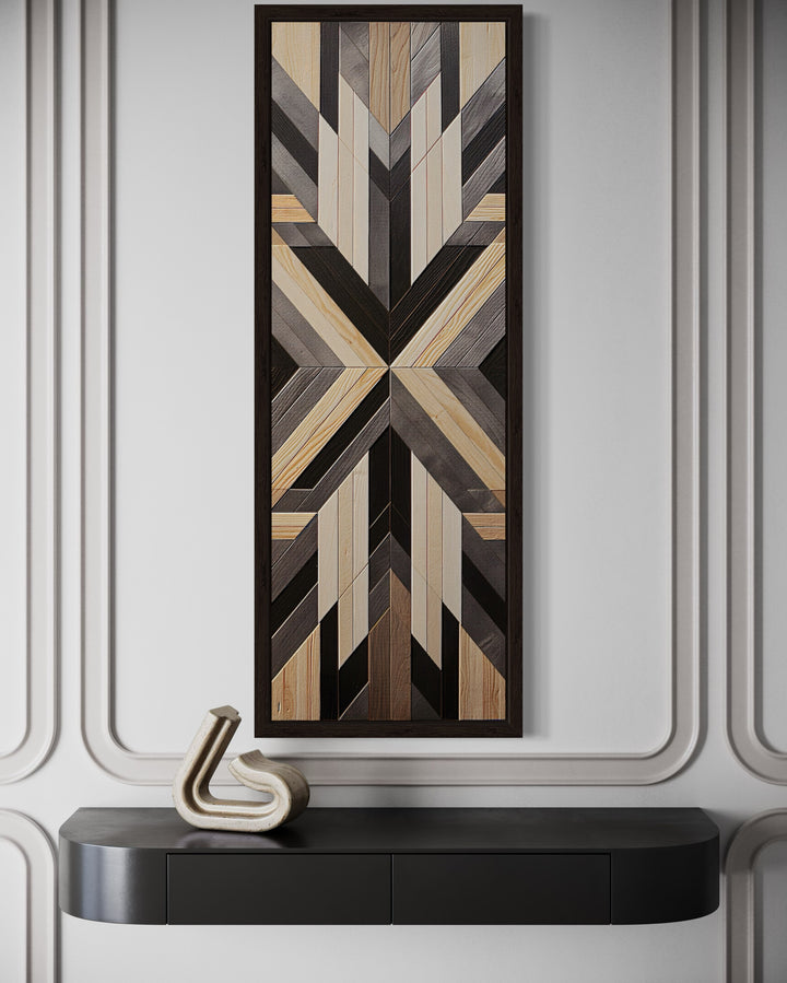 Tall narrow vertical framed canvas wall art with neutral brown Aztec-inspired geometric patterns.