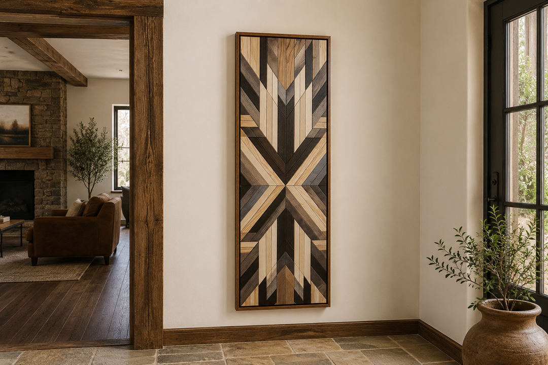 Tall narrow vertical framed canvas wall art with neutral brown Aztec-inspired geometric patterns.