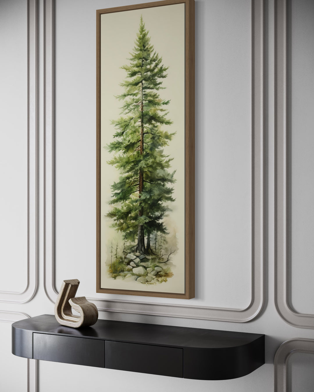 Tall narrow pine tree vertical framed canvas wall art hanging above a black console table.