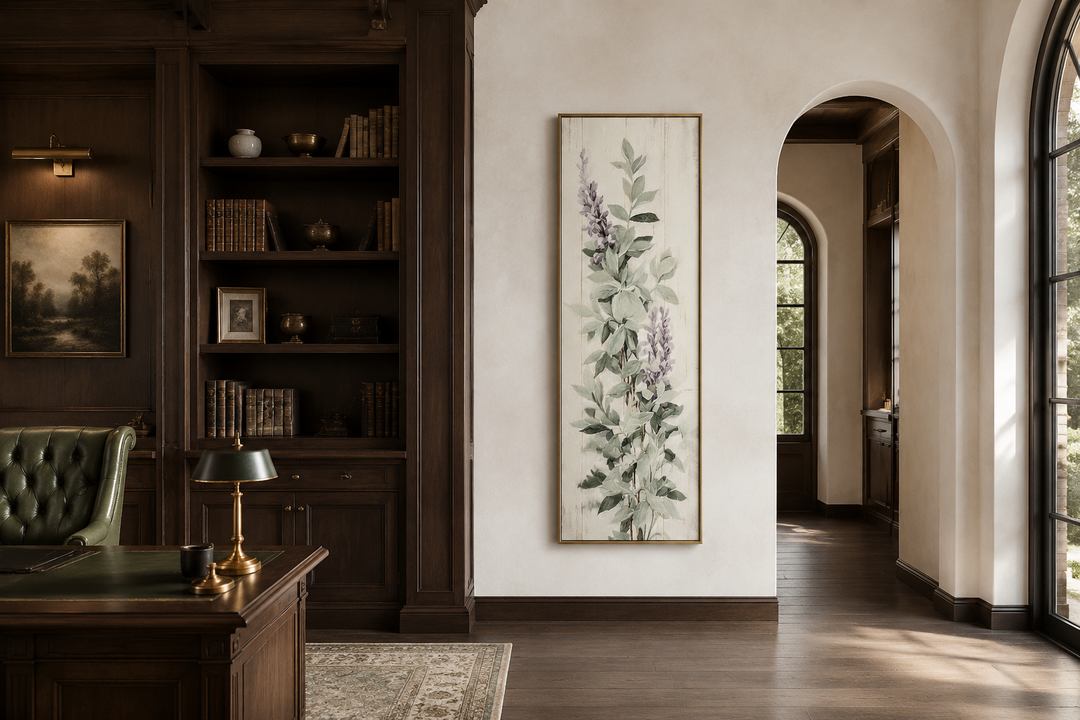 Tall narrow framed canvas wall art featuring sage green basil leaves and purple flowers.