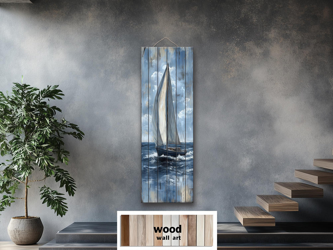 Tall narrow sailboat wall art printed on vertical distressed wood planks.