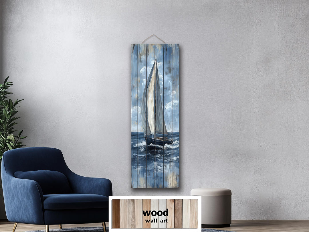 Tall narrow sailboat painting on distressed wood planks, hanging in a modern living room.