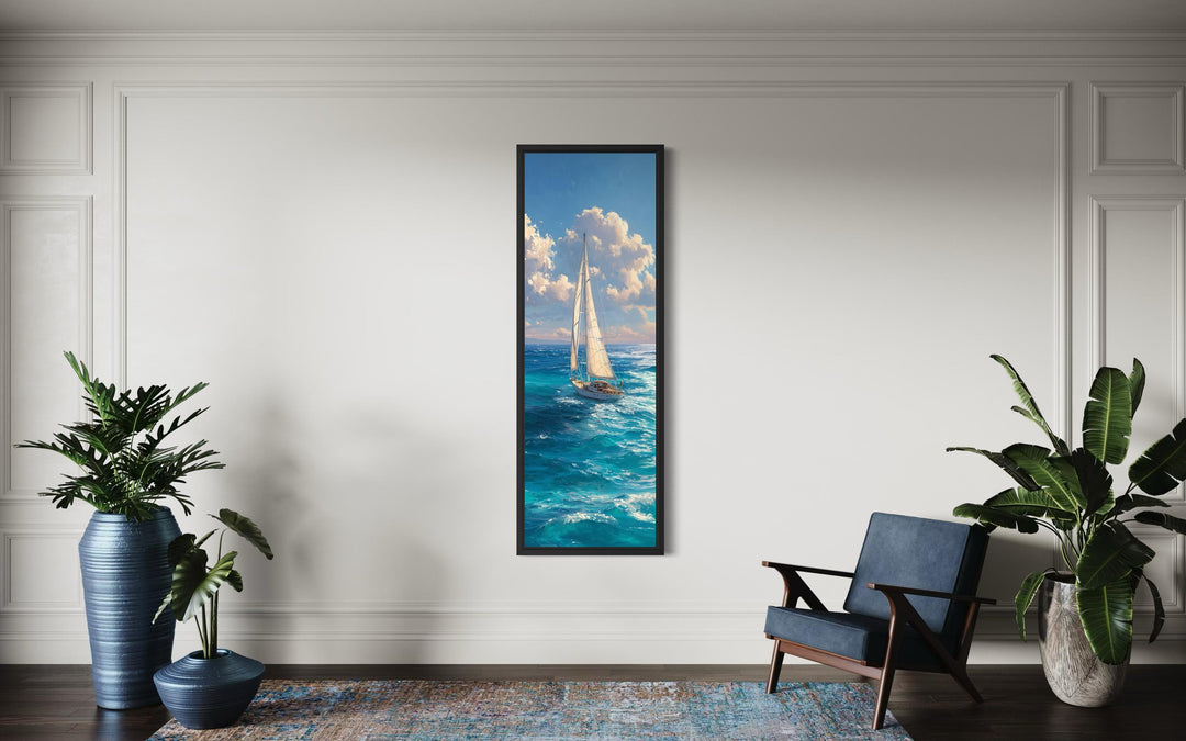 Tall narrow vertical canvas print of a sailboat on a blue ocean under a cloudy sky.