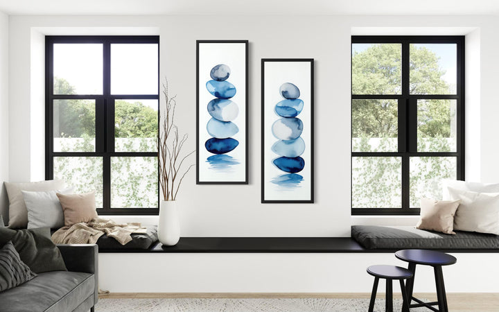 Set of 2 tall narrow canvas prints featuring stacked blue watercolor zen stones on white backgrounds.