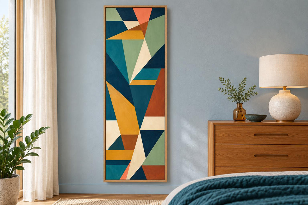 Tall narrow vertical mid-century modern geometric abstract canvas wall art in teal, ochre, and rust.