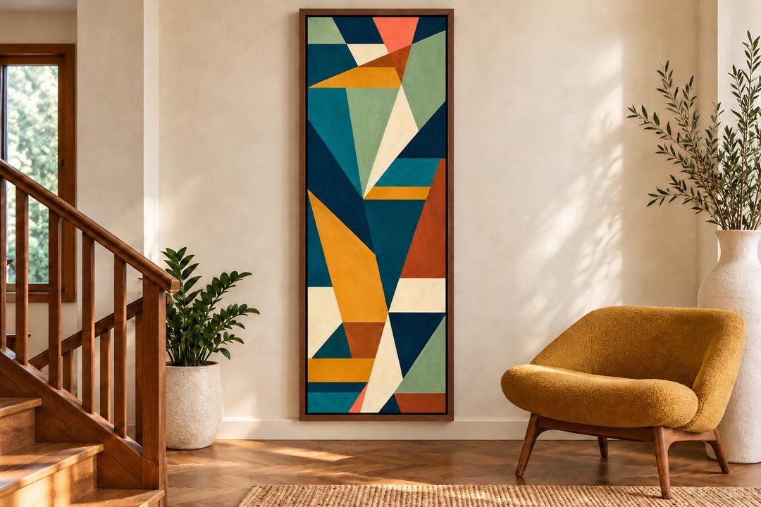 Tall narrow vertical mid-century modern geometric abstract canvas art in teal, ochre, and rust.