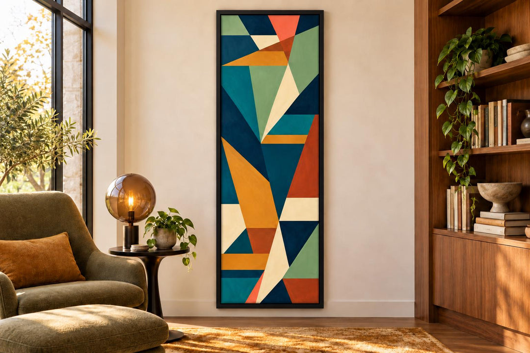 Tall narrow vertical mid-century modern geometric abstract canvas wall art in teal, ochre, and rust.