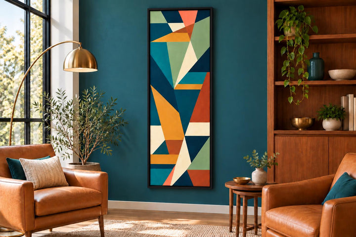 Tall narrow vertical mid-century modern geometric abstract canvas art in teal, ochre, and rust.