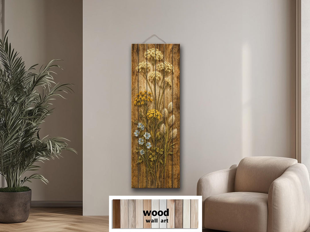 Tall narrow rustic wood wall art featuring a distressed wildflower print in a neutral room.
