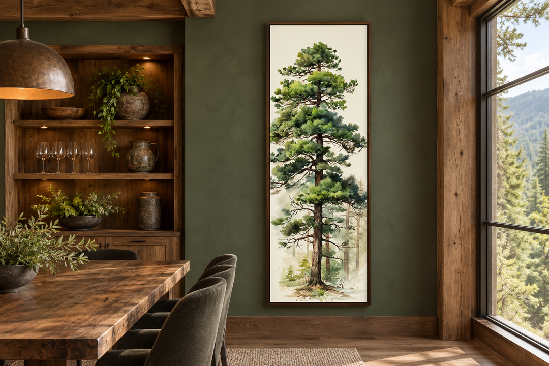 Tall Pine Tree Narrow Vertical Canvas Wall Art in a walnut frame on a dark green dining room wall.