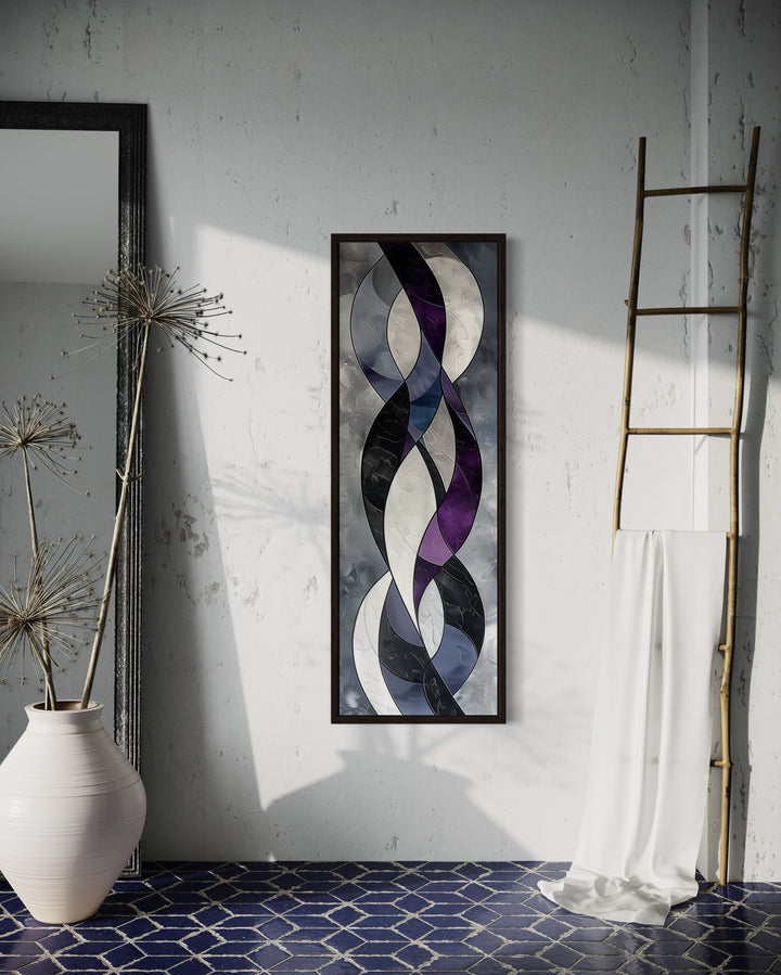 Tall thin vertical framed canvas wall art with purple and grey geometric abstract flowing shapes.