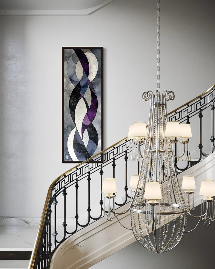 Tall thin vertical framed canvas wall art with purple and grey geometric abstract shapes.