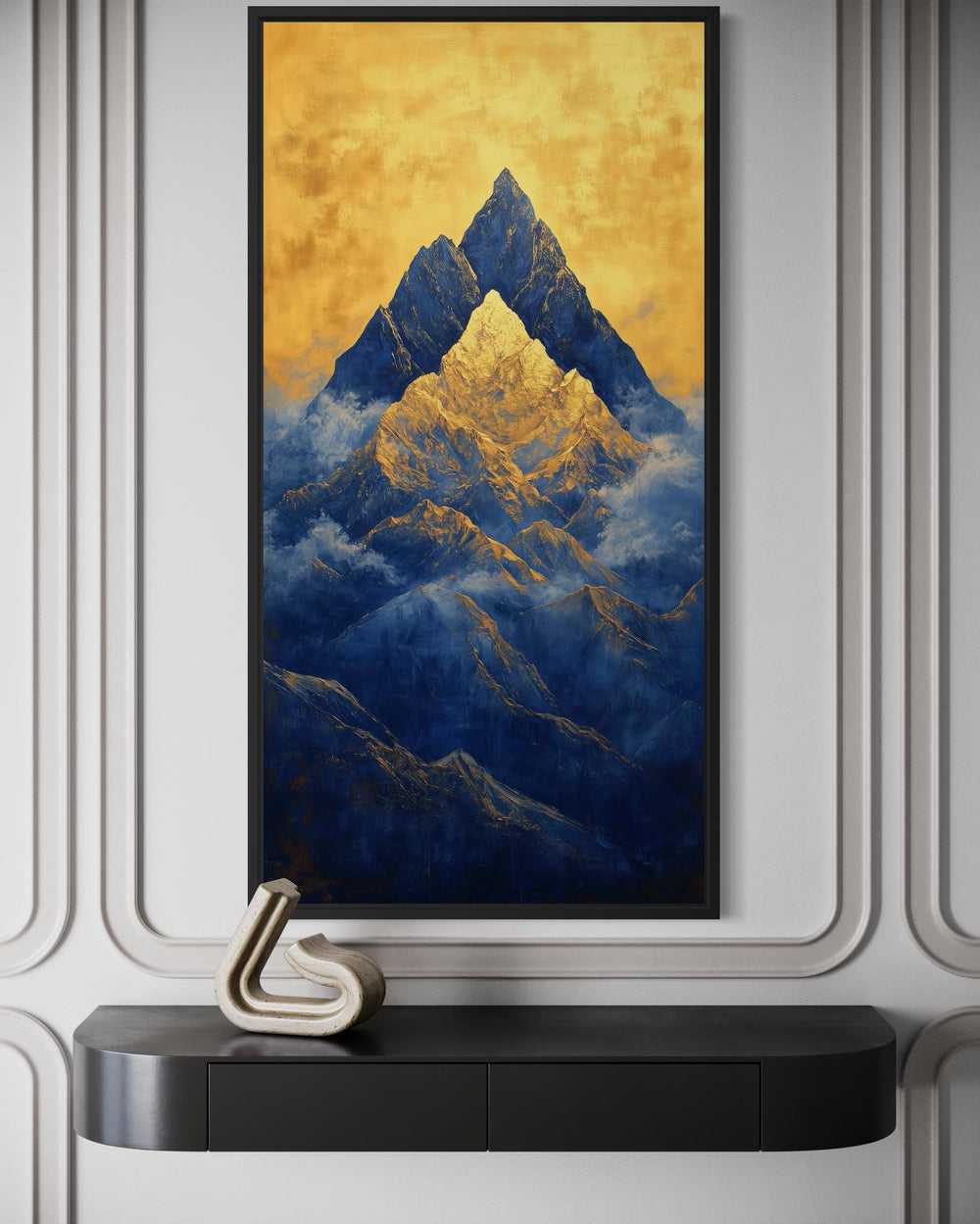 Tall vertical framed canvas wall art of blue mountains under a glowing golden sky.