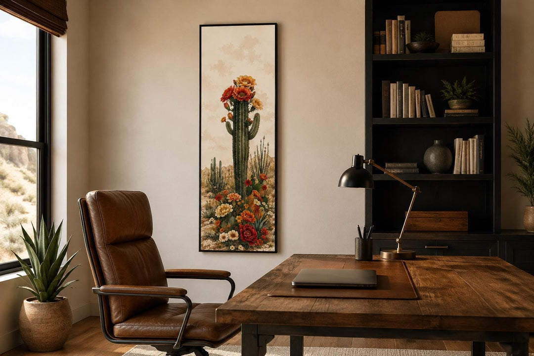 Tall vertical canvas art of a blooming saguaro cactus in a vintage botanical style on a home wall.