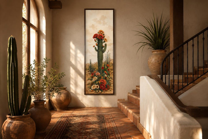 Tall vertical canvas art of a blooming saguaro cactus in a narrow entryway with desert decor.