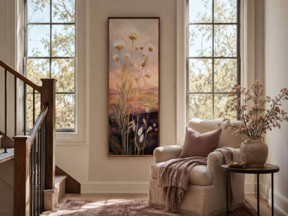 Tall vertical canvas art of wildflowers and grasses against a gold and purple sunset sky.