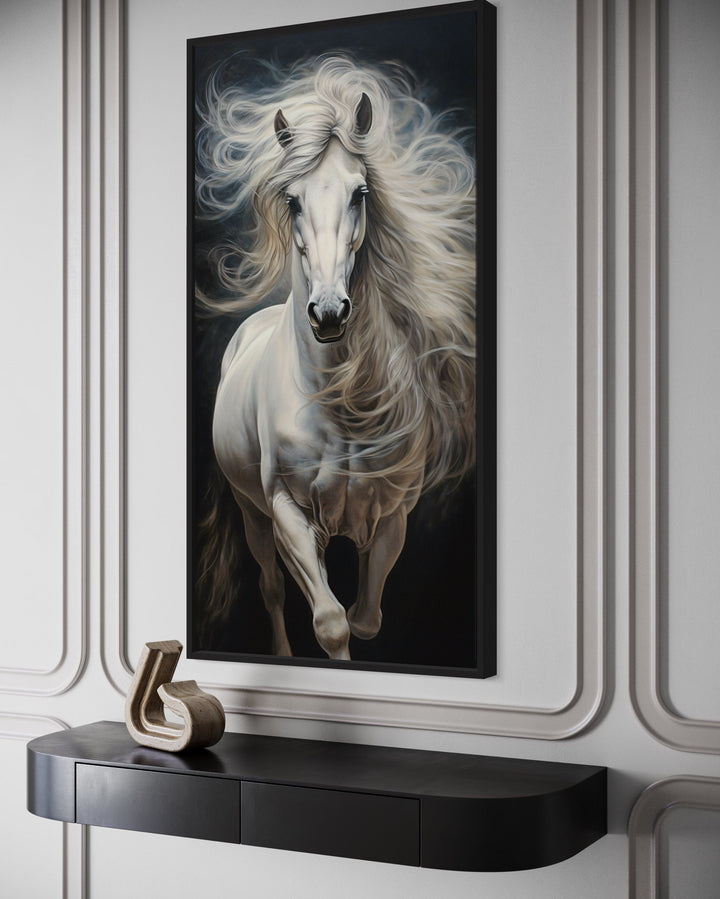 Vertical canvas print of a white horse with a flowing mane against a black background on a wall.